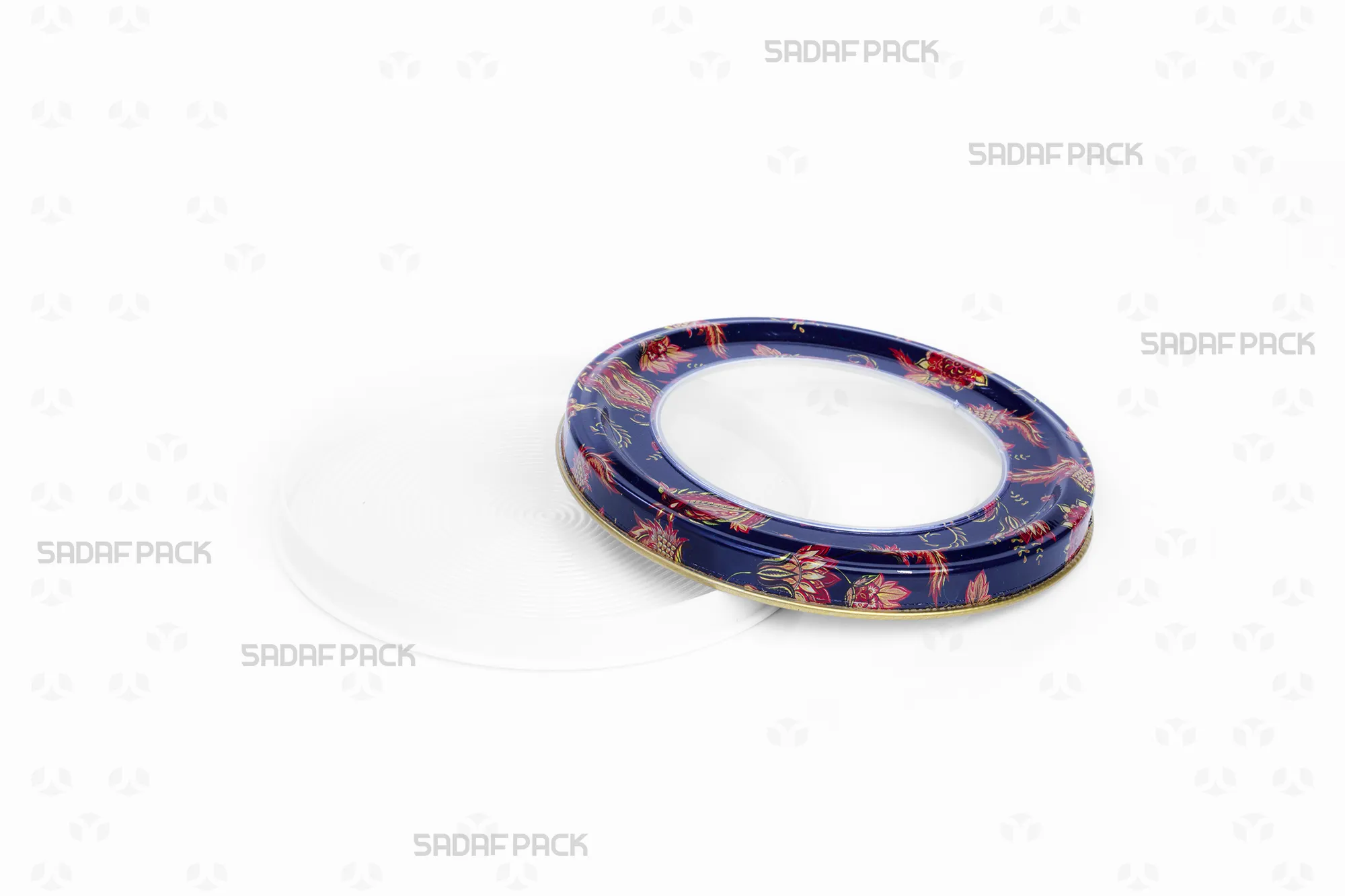 نمای بالا از قوطی 12 فلزی اسپانیا کف بالا خالی با طرح ترنج سورمه ای، درب باز برای نمایش فضای داخلی و کف بالا.