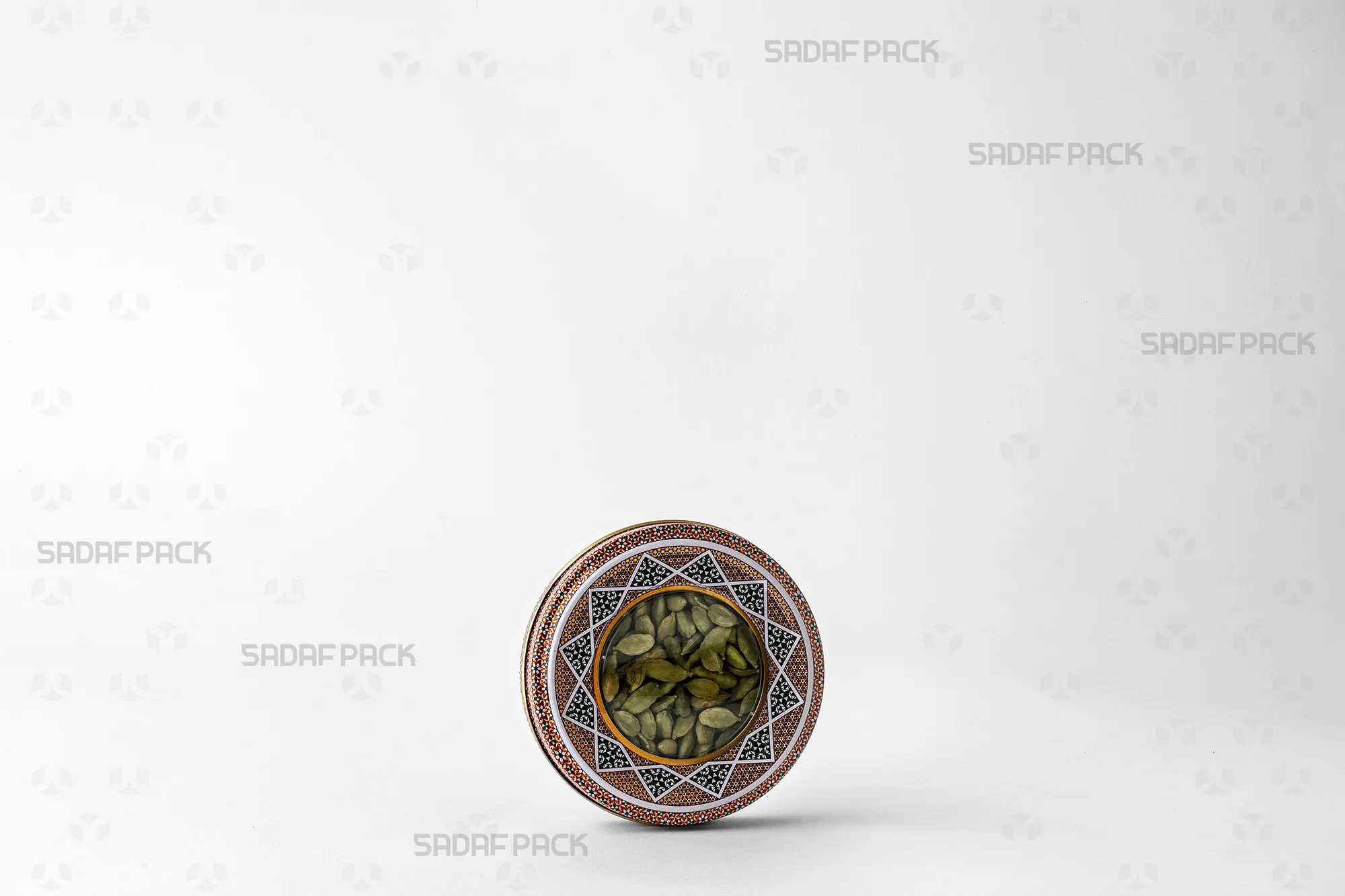 قوطی 10 گرمی فلزی صدف پک حاوی هل سبز، مناسب برای صادرات و نگهداری طولانی مدت