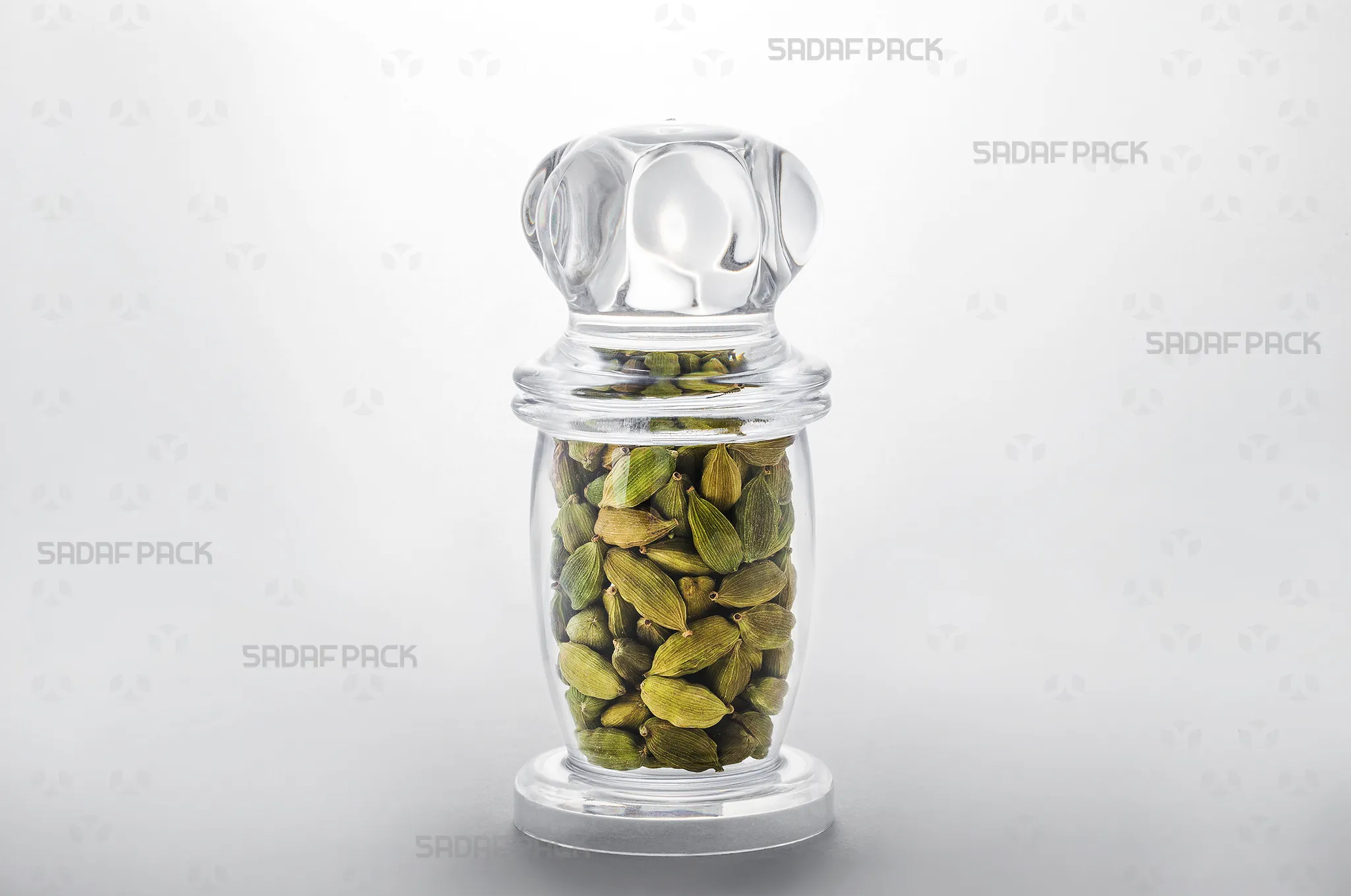 ظرف میلاد بزرگ پر شده با هل در نمای سهرخ، مناسب برای بستهبندی صادراتی