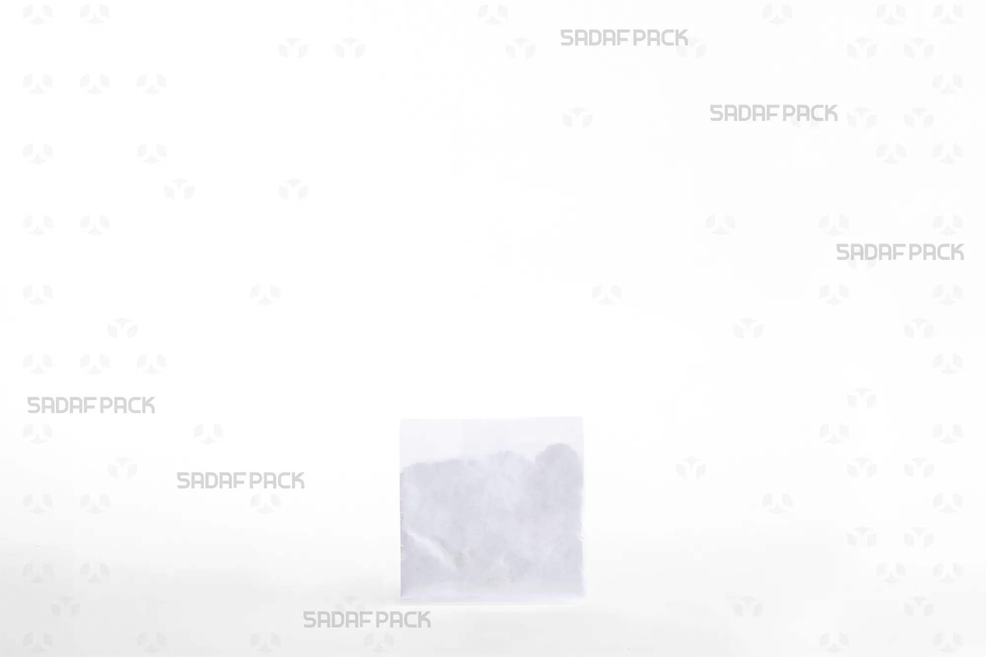 پاکت ترسبافان ته بریده 7×7 سانتیمتر صدف پک پر از پودر نارگیل با ترسبافان شفاف و قابلیت دوخت حرارتی برای بستهبندی حرفهای نیم گرم زعفران