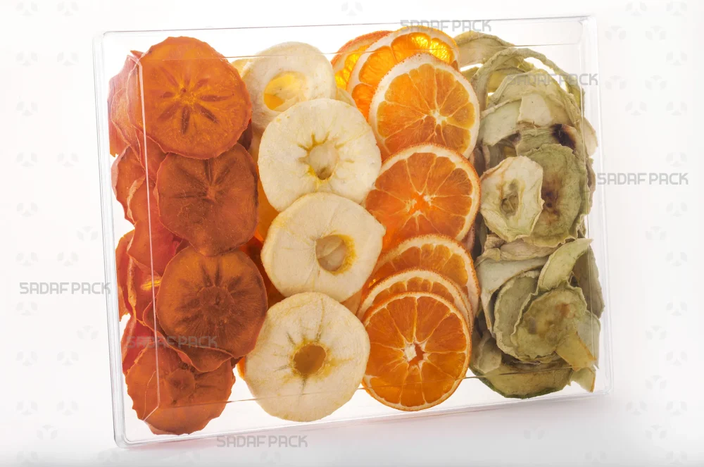 ظرف کریستالی مستطیل 500 پر شده با میوه خشک، ایده‌آل برای بسته‌بندی صادراتی خشکبار و شیرینی‌جات 