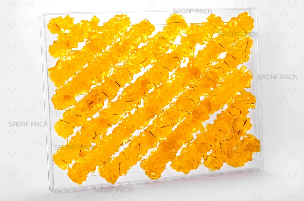 ظرف کریستالی مستطیل 500 پر شده با نبات، ایده‌آل برای بسته‌بندی صادراتی خشکبار و شیرینی‌جات 